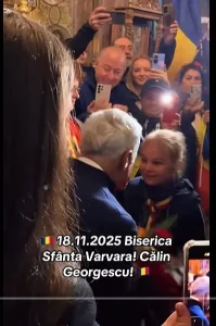 C.G oferind „binecuvântarea” sa copiilor cu tricolor la gât